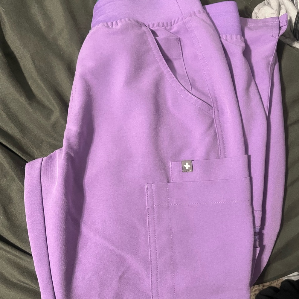 Purple scrub pants.